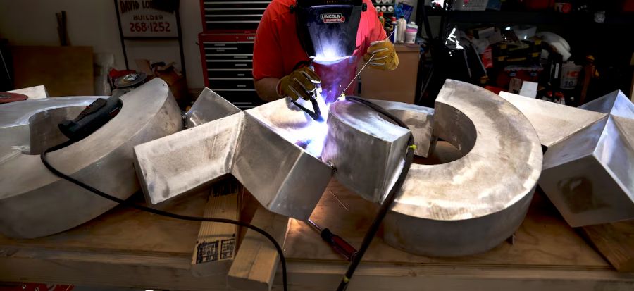 rob lorenson makes monumental works that glisten gleam and glide 004